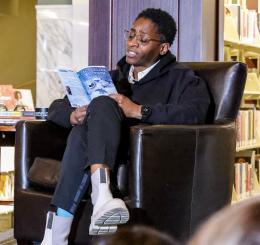 Author Jacqueline Woodson reads an excerpt from one of her books on March 8 at the Central Library.