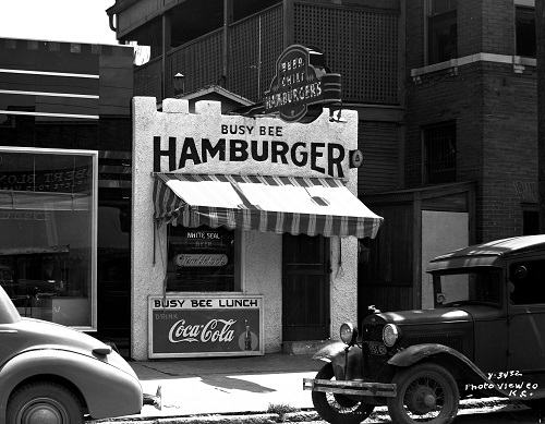 Hamburger shop with Coca-Cola sign out front
