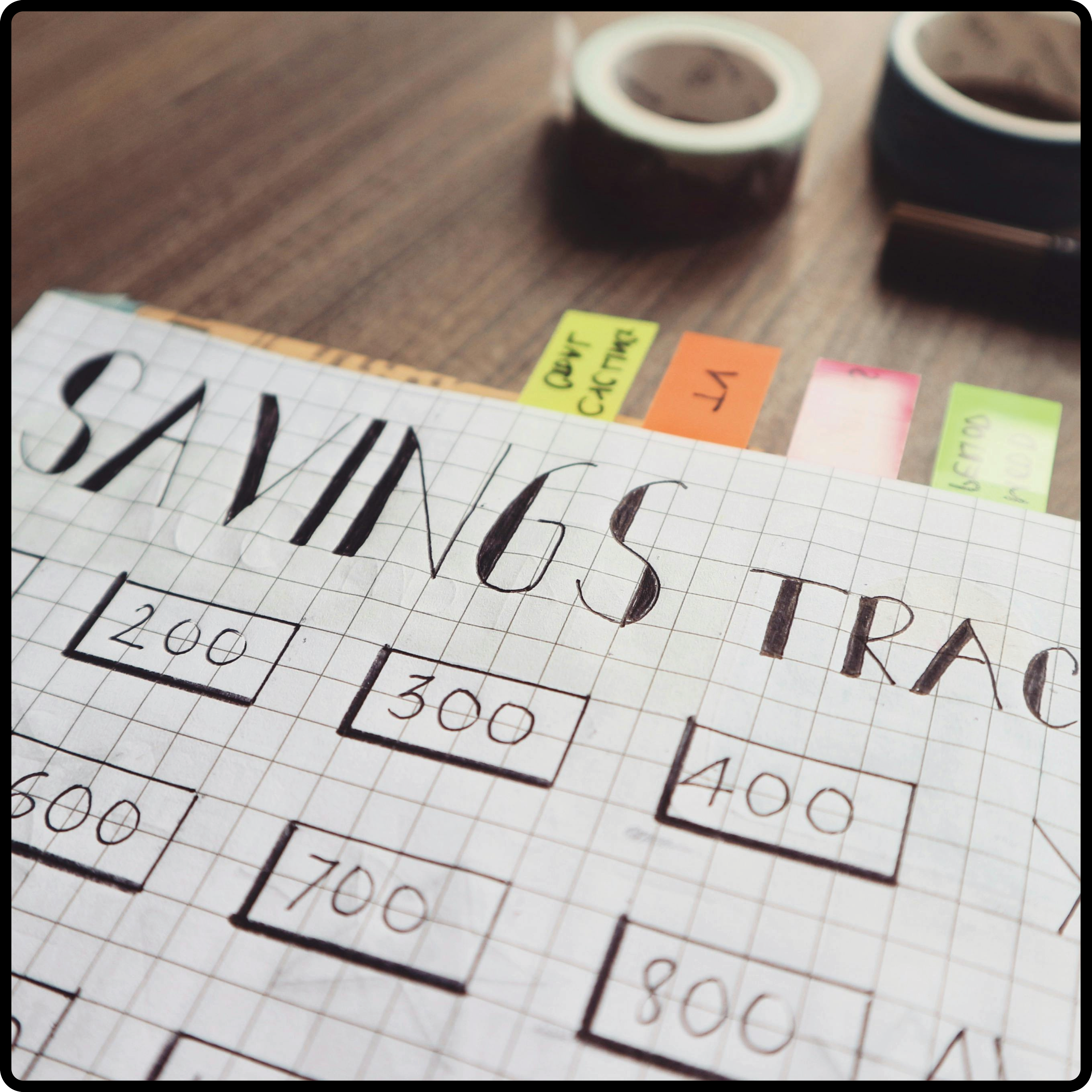 grid paper with savings tracker