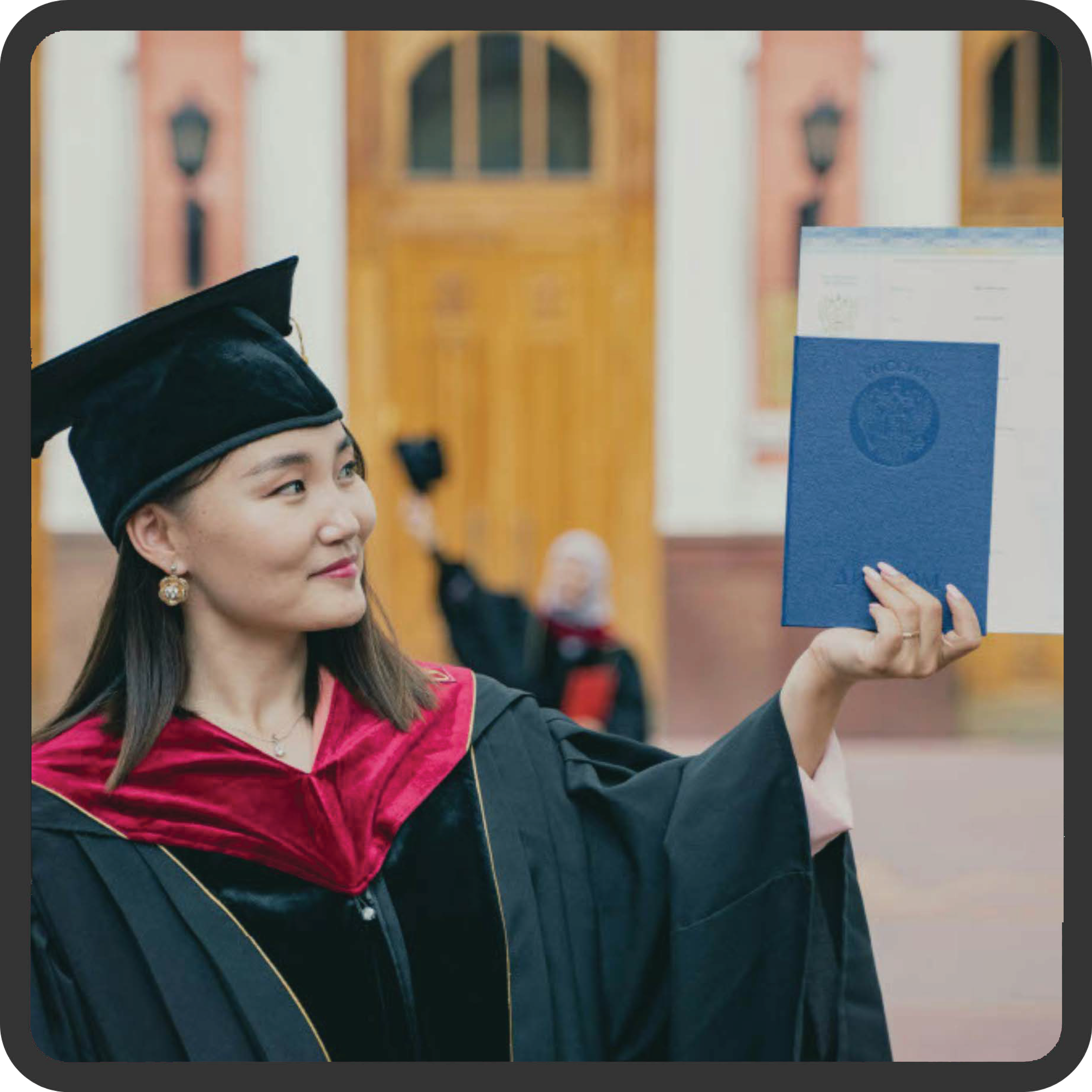 woman in cap and gown with degree