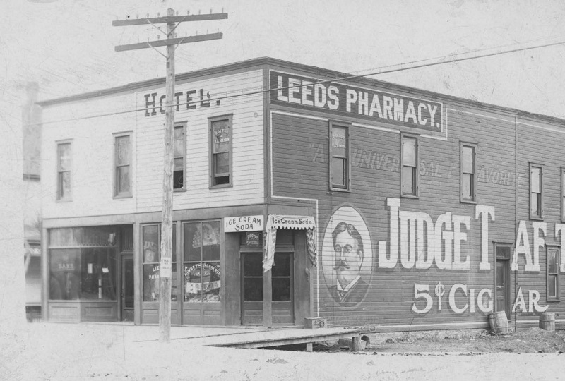 Early-1900s photograph of the Leeds Pharmacy and Hotel on E. 37th Street, across from Polfer & Renick.  Courtesy of Marilyn and Bruce Schlosser.