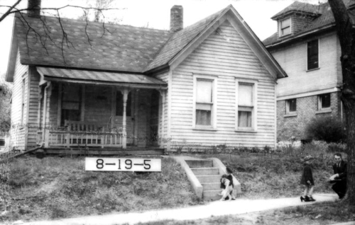 Two children, including one in high heels and another with pet, were included in a 1940 Jackson County tax assessment photo.