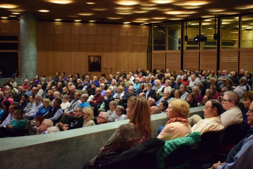 Large crowd in an auditorium