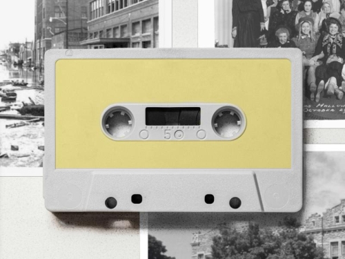 A yellow cassette tape with a black and white photo background