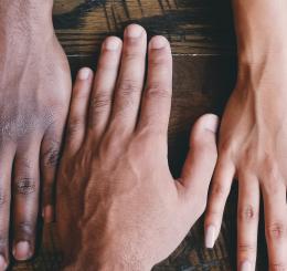 hands on a wooden suface