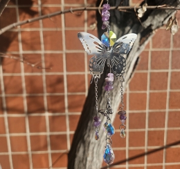 butterfly suncatcher in tree