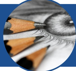 3 pencils and drawing of an eye