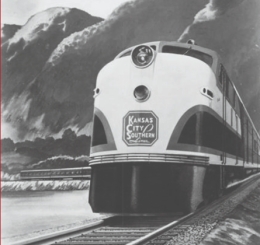 train in front of mountains in black and white