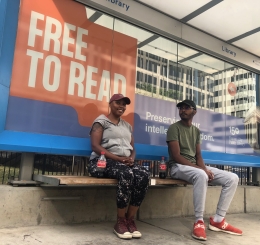 Free to Read is wrapped on a KC Streetcar stop in downtown Kansas City, Missouri.