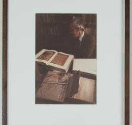 Scholar with Illuminated Manuscripts