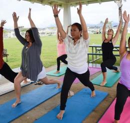 seven women in yoga poses
