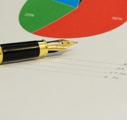 fountain pen on paper with pie chart