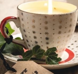 candle in teacup