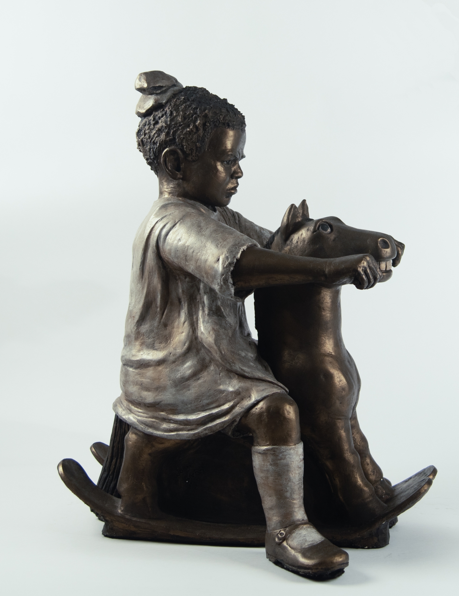 Child on Rocking Horse