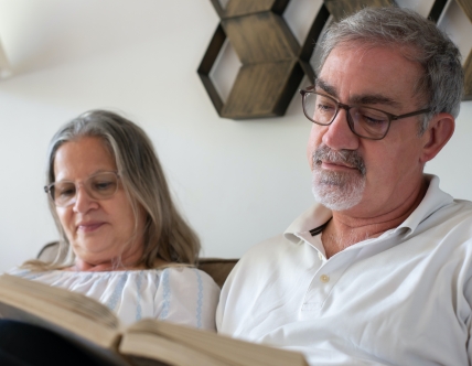 two seniors reading