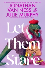 A plastic dinosaur with a purple dress, pink boa, large over ear headphones and a purse stands in front of a purple backdrop