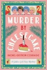 Cartoon drawings of the Golden Girls with two drawings of flamingos on the top of the pink cover (with a green palm tree boarder). There's a piece of cheesecake with a knife stabbed in the top.