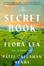 The cover shows a field of green grass with a river or creek cutting right down the middle