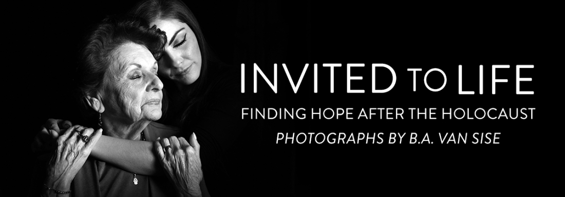 woman hugs another in black and white