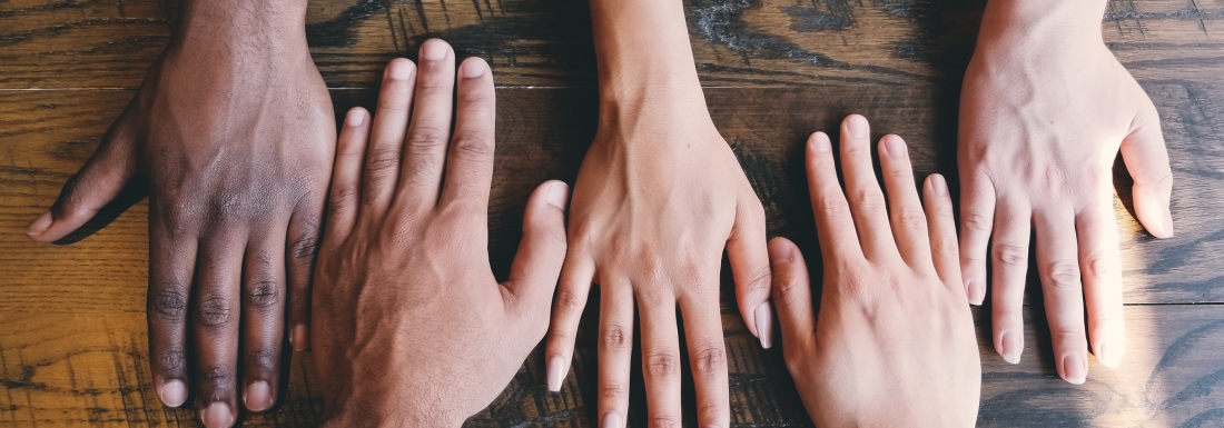 hands on a wooden suface