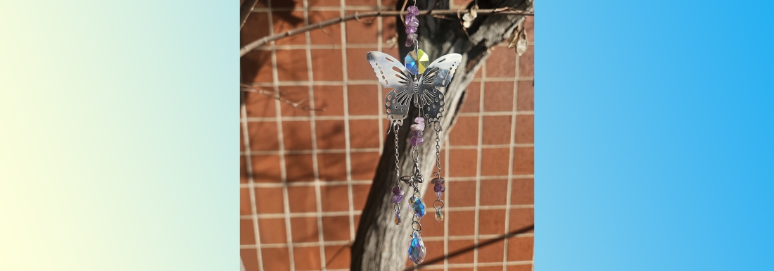 butterfly suncatcher in tree