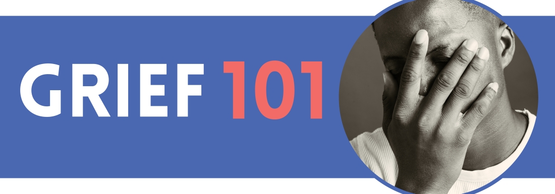 man with hand on face