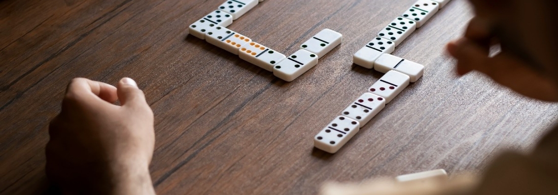 person playing dominos 