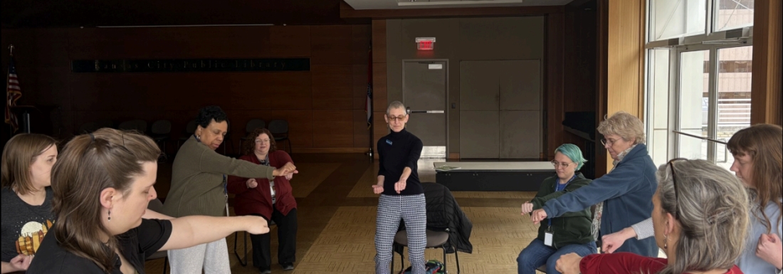 group of people doing moving meditation