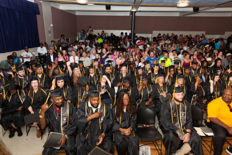 Excel high school students graduating