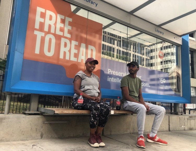 Free to Read is wrapped on a KC Streetcar stop in downtown Kansas City, Missouri.