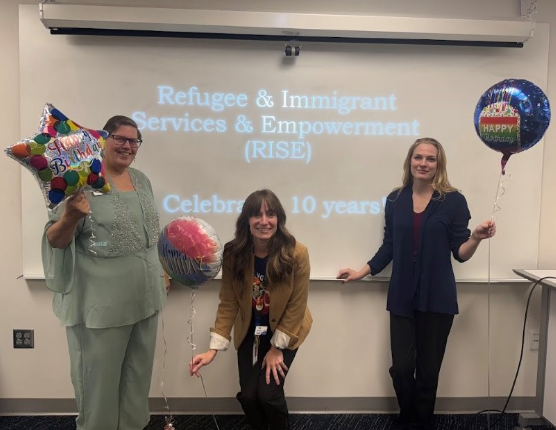 Refugee & Immigrant Services & Empowerment (RISE) staffers at the Library