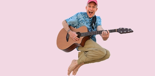 Mr. Stinky Feet jumping with guitar