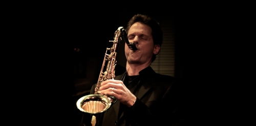 man playing saxophone