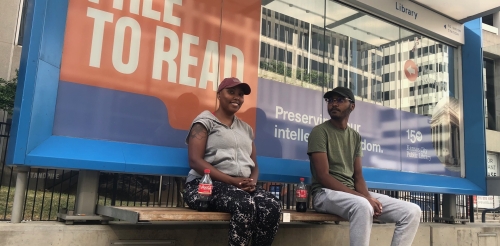 Free to Read is wrapped on a KC Streetcar stop in downtown Kansas City, Missouri.